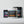 Three supplement tubs from iAMINOS on a clean white studio background: a front white tub labeled HYDRATE+ Solar Orange, with two darker black-and-pink tubs behind it labeled iAMINOS Athlete Pro+ and iAMINOS Brain Health+.